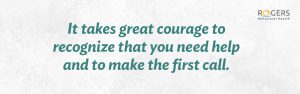 The image features a soft, textured white background with a hint of gray, creating a calming and subtle surface. In the center of the image, it says "It takes great courage to recognize that you need help and to make the first call."