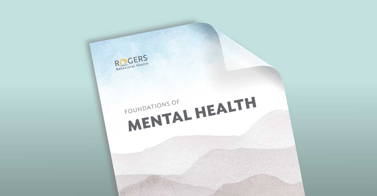 Booklet cover titled "Foundations of Mental Health" with abstract hill designs.