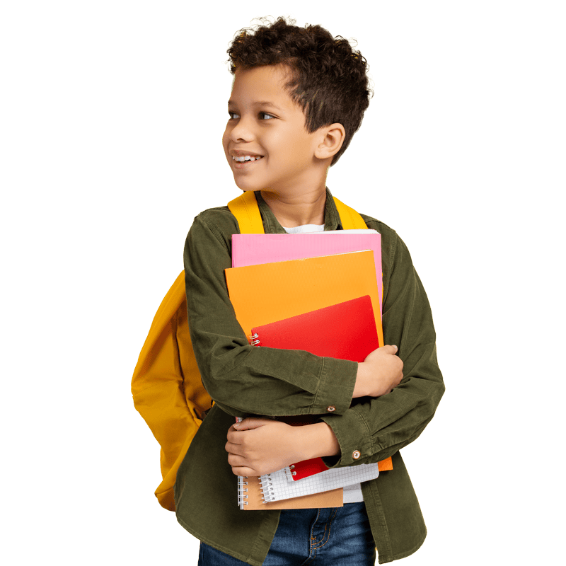 Child with a yellow backpack holding colorful notebooks.